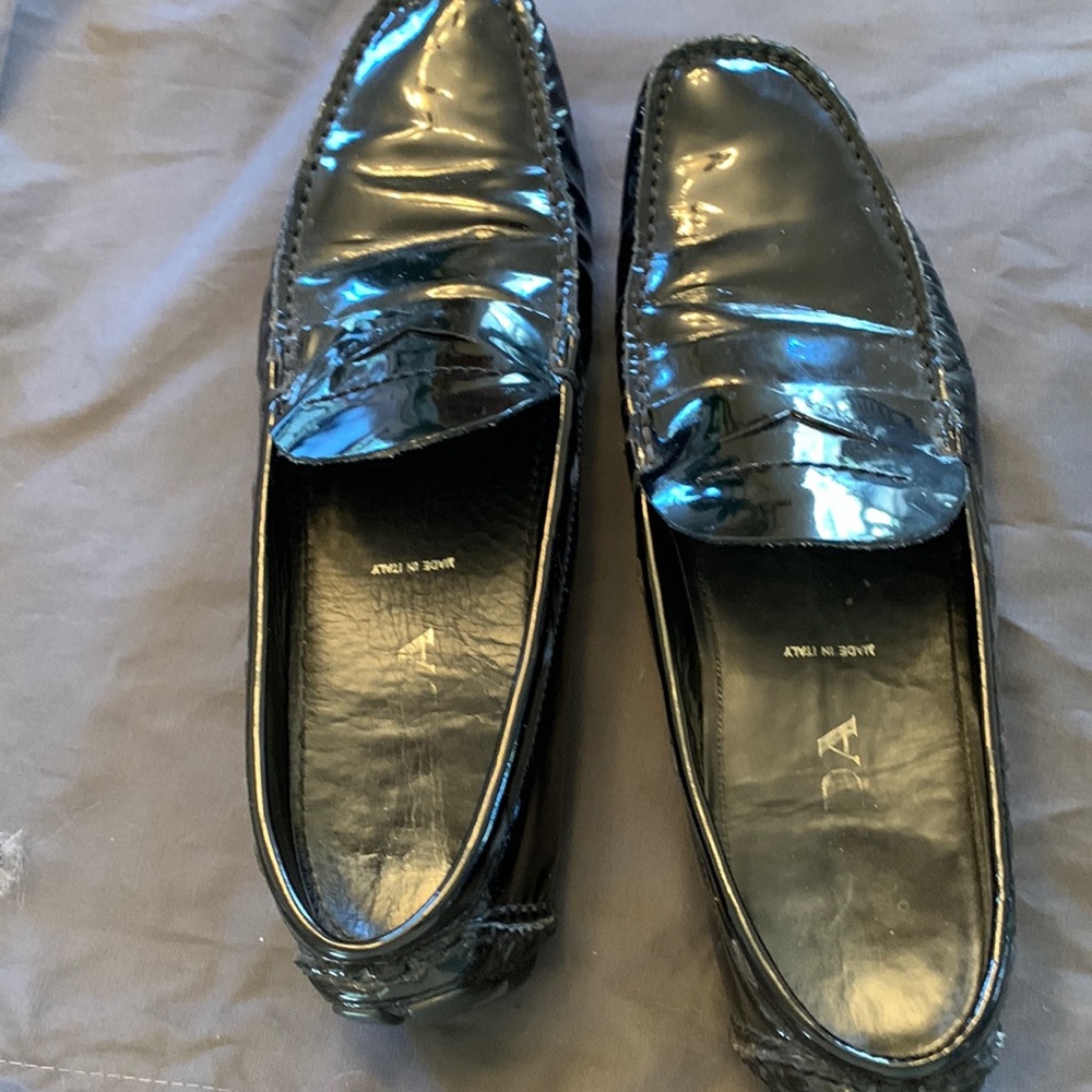 Black shiny Prada shoes